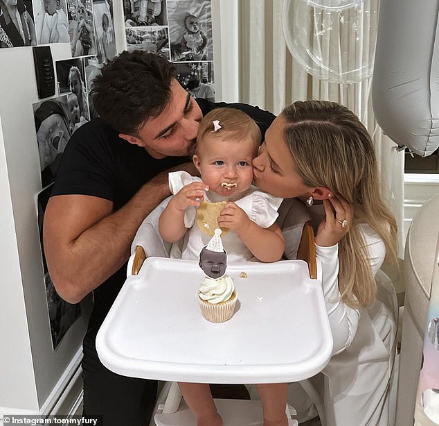 While their relationship has been on the rocks over the past year, Molly-Mae and Tommy Fury's bank balance certainly hasn't (pictured with their daughter Bambi, two)
