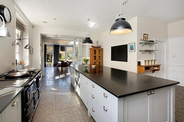 The house also boasts two offices, a 35ft dining room and a large kitchen and breakfast room heated by an Aga
