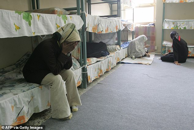 Human rights organisations warn that these practices are not isolated incidents, but form part of a wider pattern across Iran's detention system. Pictured: Iranian women inmates sit at their cell in the infamous Evin jail in 2006