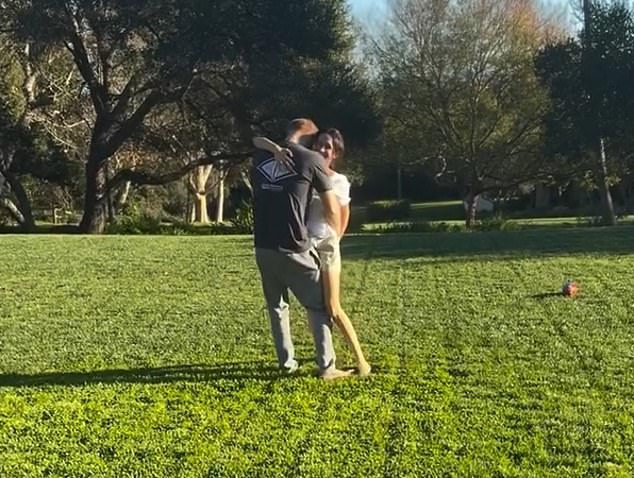 Fans of the Duchess of Sussexwere also treated to a short clip of Meghan and Harry passionately dancing together, bare foot, in a green field