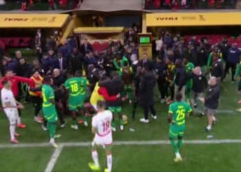 Afcon chaos as Senegal manager orders players off pitch after hosts Morocco given 98th-minute penalty