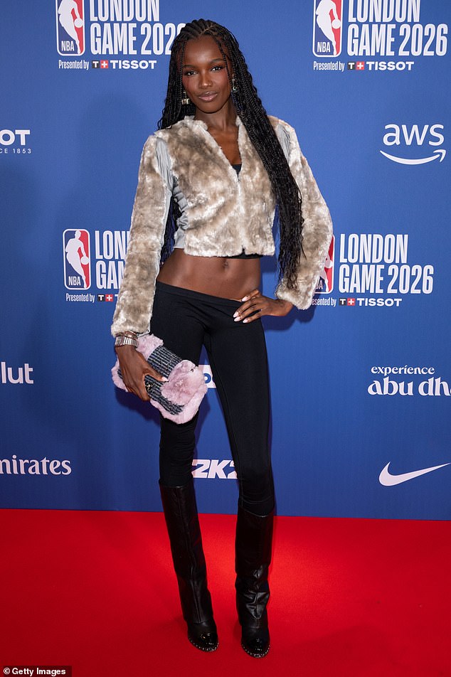 Supermodel Leomie Anderson flashed her jaw-dropping abs in a skimpy crop top and skin-tight trousers