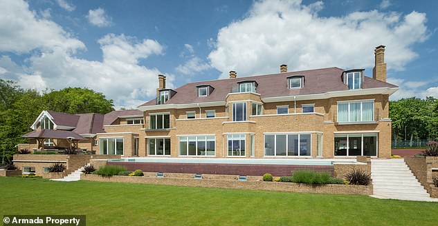 The men are wanted in India over allegations involving fraud and financial irregularities, but live in a life of luxury in the UK. Pictured is Mallya's Hertfordshire mansion