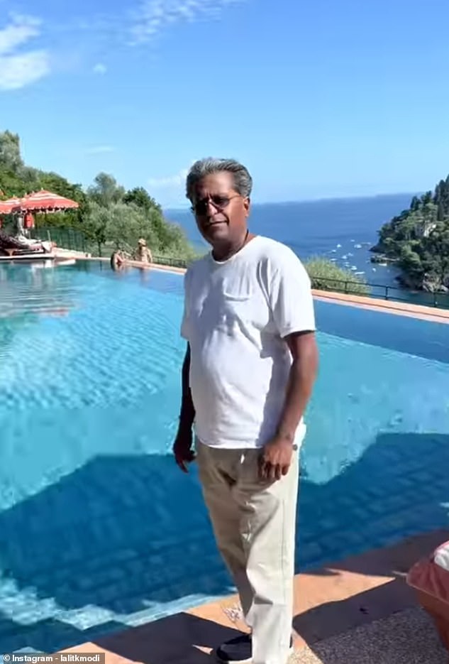 Modi, posing for a snap by the pool while on holiday in Portofino, Italy. The 62-year-old is wanted in India over accusations of money laundering and financial irregularities