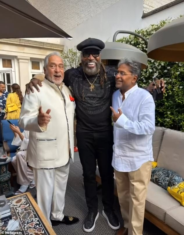 The two controversial businessmen posing with cricketer Chris Gayle at a party they threw