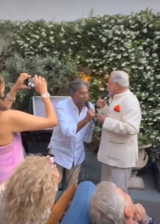 Friends watch on as Mallya and Modi sing Frank Sinatra's 'My Way' at a party