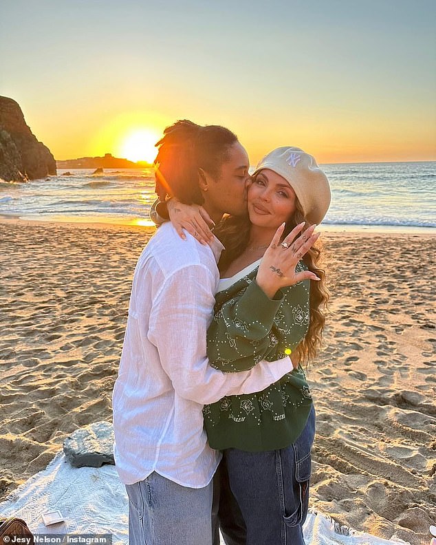 Zion proposed to Jesy during a romantic sunset trip to the beach in September with the singer sharing a close up shot of the sparkling diamond