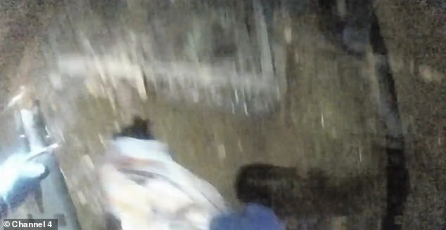 Police bodycam footage shows the moment an officer picked up the knife from the ground