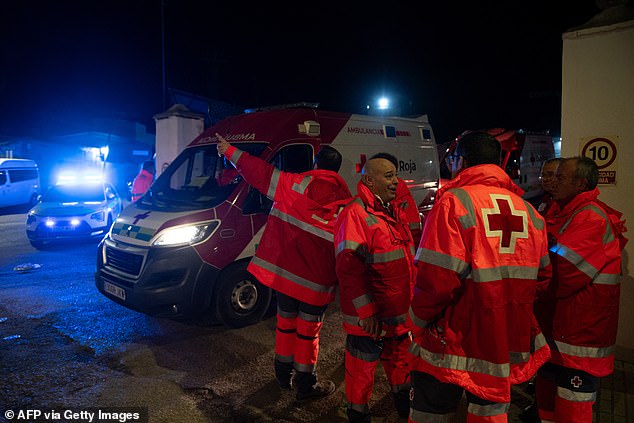 Members of the Red Cross work after a train accident in Adamuz, southern Spain, early on January 19, 2026