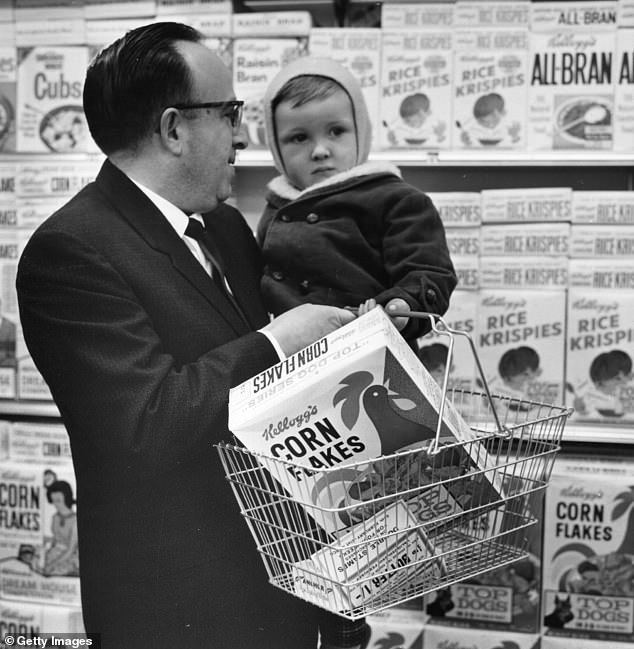 The arrival of supermarkets, American fast food outlets and processed foods paved the way for the modern obesity crisis. Pictured, a father shopping with his baby at a Foodtown Supermarket in Lewisham, London, 1974