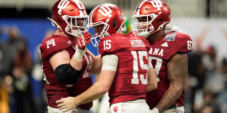 Who is performing the national anthem at the College Football Championship?