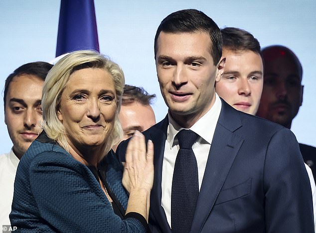 Marine Le Pen and Bardella during a political meeting on June 2, 2024, in Paris