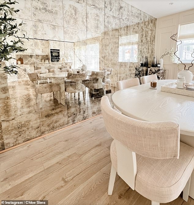 While sometimes it's multiple scattered little mirrors, othertimes - like in Chloe's case - it's a huge accented wall