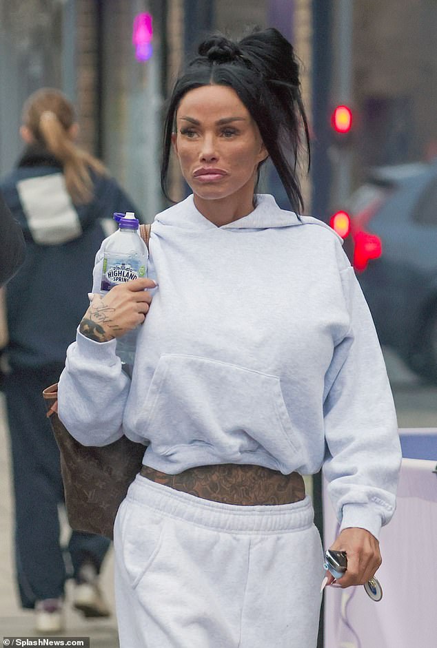 She said: 'How much am I loving my new, kissable lips and next week these aren't the only lips that I'm going to make kissable'