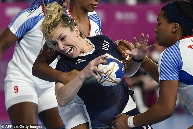 Sarah Gascon is marked by Cuban players during the Handball Women Bronze Medal Match during the Lima 2019 Pan-American Games