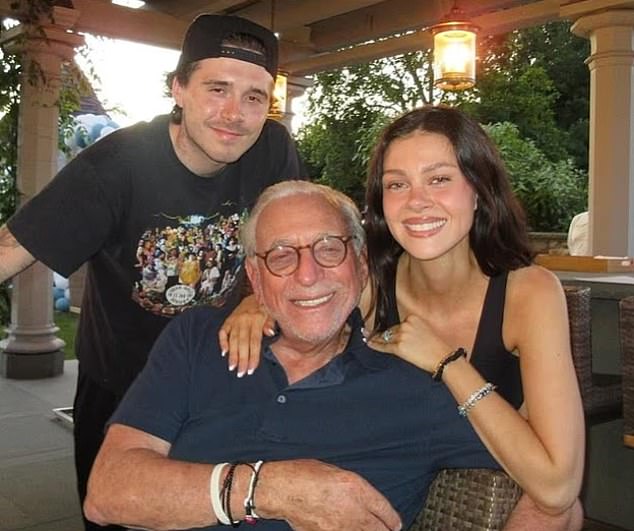 Brooklyn spends a lot of time with Nicola’s billionaire parents Nelson, pictured centre, and Claudia