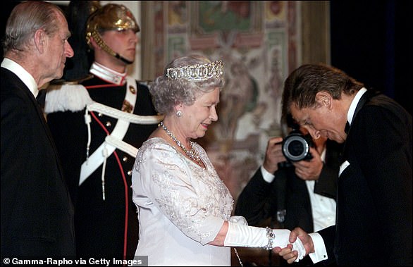 Seen with Britain's Queen Elizabeth (C) together with Prince Philip (L) at Quirinal presidential palace before the state banquet with Italian President Carlo Azaglio Ciampi in Rome, Italy in 2010
