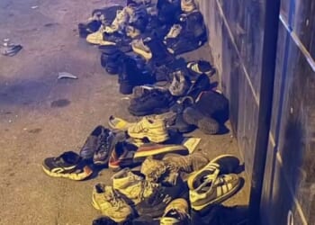 Haunting picture shows abandoned shoes after Iran burned surrendering protesters to death inside a bazaar