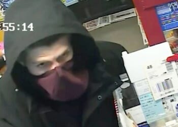 Moment brave shopkeeper armed with only walking stick fights off knife-wielding robber