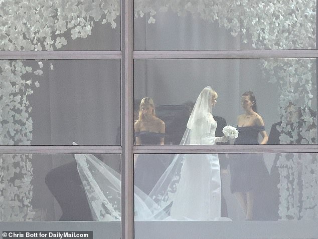 The actress, 31, sported a stunning couture Valentino bridal dress on the big day (pictured), despite previous reports she would wear a bespoke gown designed by her mother-in-law