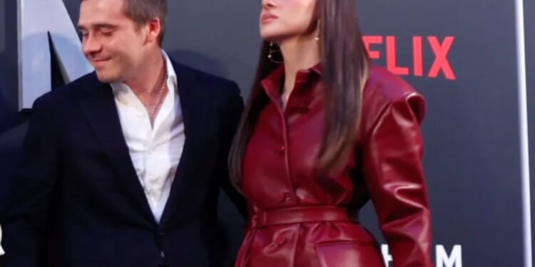 Watch the tense moment Brooklyn pulls fuming wife Nicola into Beckham family pic at premiere