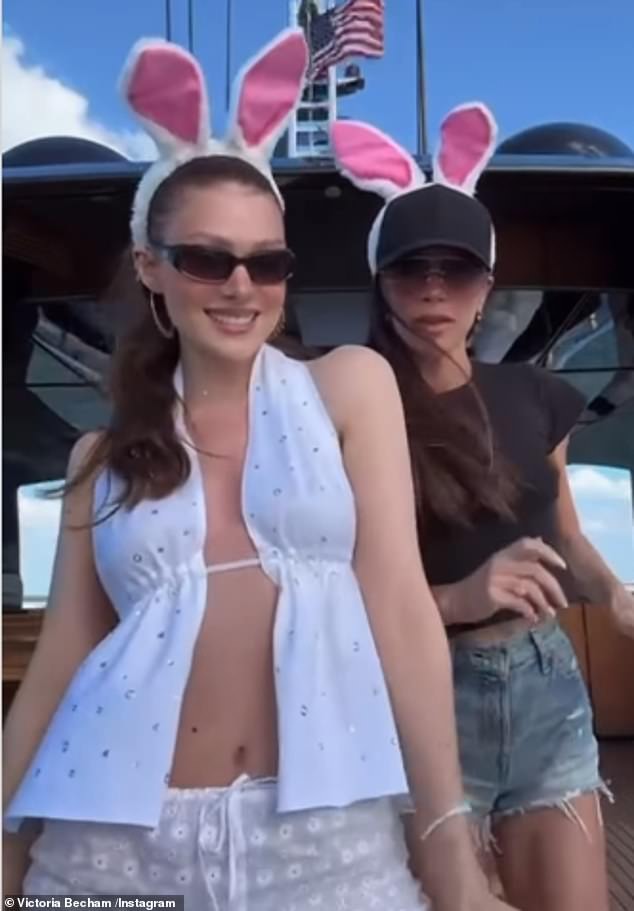 While fashion designer Victoria showcased her trim physique in a black T-shirt and denim shorts, Nicola caught the eye in a revealing cut-out halterneck top while boogying