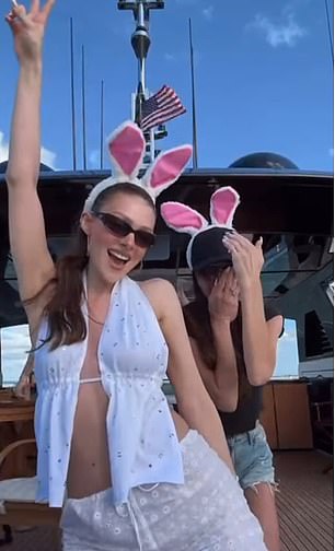 Curiously, Nicola appeared to mimic Victoria by throwing an arm in the air and flashing a peace-sign - one of the former Spice Girl's signature moves during her time with the band