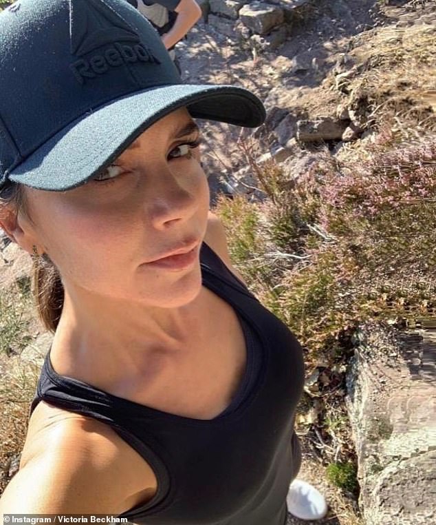 The former pop star has always loved a baseball cap - often with the Yankees logo - teemed with a casual black vest and lycra