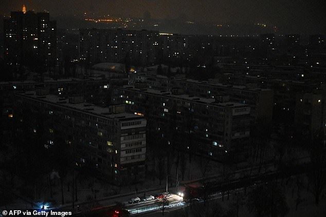 Residential area on the left bank of Dnipro River during a power outage in Kyiv on January 13, 2026, following Russian missile and drone attacks on Ukrainian energy infrastructure
