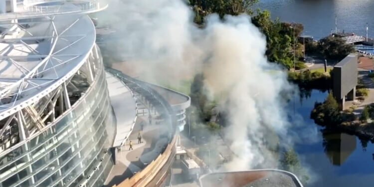 Scary moment fire breaks out during match at 60,000-capacity Ashes stadium as emergency services rush to the scene