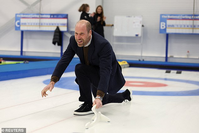 The Prince of Wales has a go at curling at the National Curling Academy in Stirling today