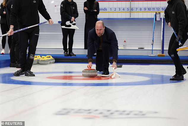The Prince of Wales has a go at curling at the National Curling Academy in Stirling today