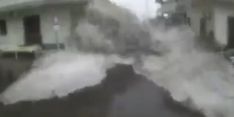 Watch moment storm surge wave hits Italian holiday island as red alerts issued after cyclone battering & 190 evacuated