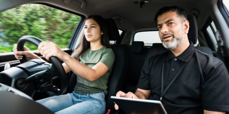 Road safety fears as learner drivers using earpieces and imposters to cheat tests spike nearly 50%