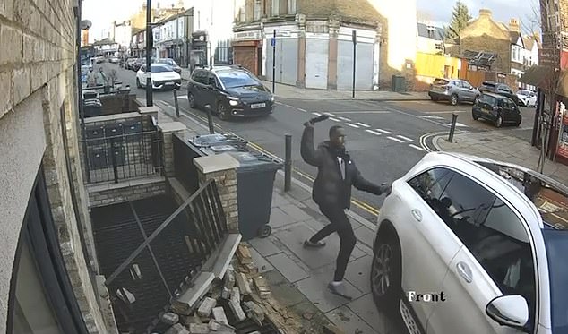 A white Mercedes vehicle is then caught swerving towards him as it mounts the pavement