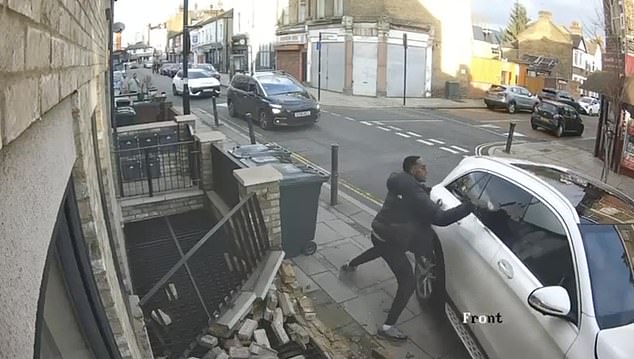 The youth then uses the knife to try and smash the car's window to allow him to get at his attacker