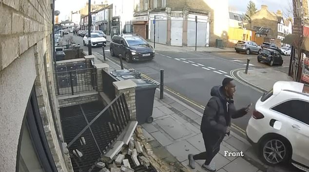 The front wall of the house was left in rubble as the vehicle sped off, chased by the knife wielding youth