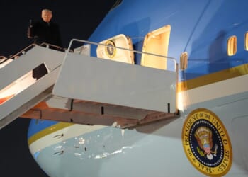 Trump's Air Force One forced to turn around after Don jets off to Davos for showdown talks with Europe over Greenland