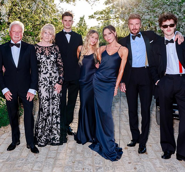 Victoria's mother and father, Tony and Jackie, joined the family for a group snap at David’s 50th. The only people missing from the photo are Brooklyn and Nicola
