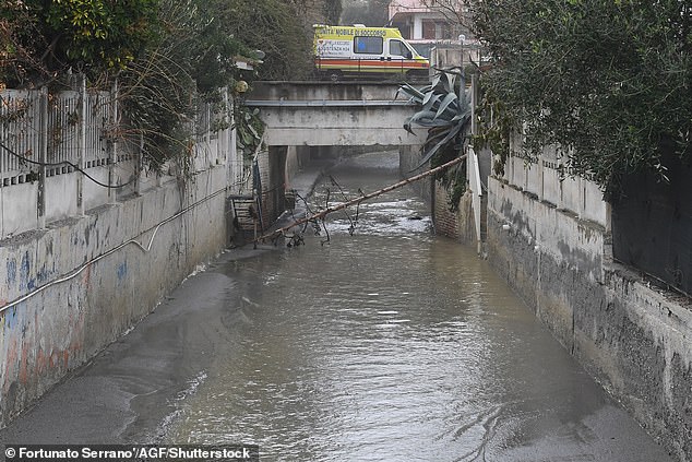 A flooded street following a storm surge in Bova Marina, Sicily