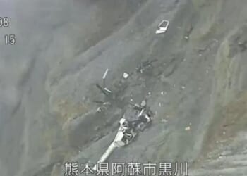 Horror pic shows helicopter wreck inside active volcano crater near cliff edge after chopper crashed as three missing