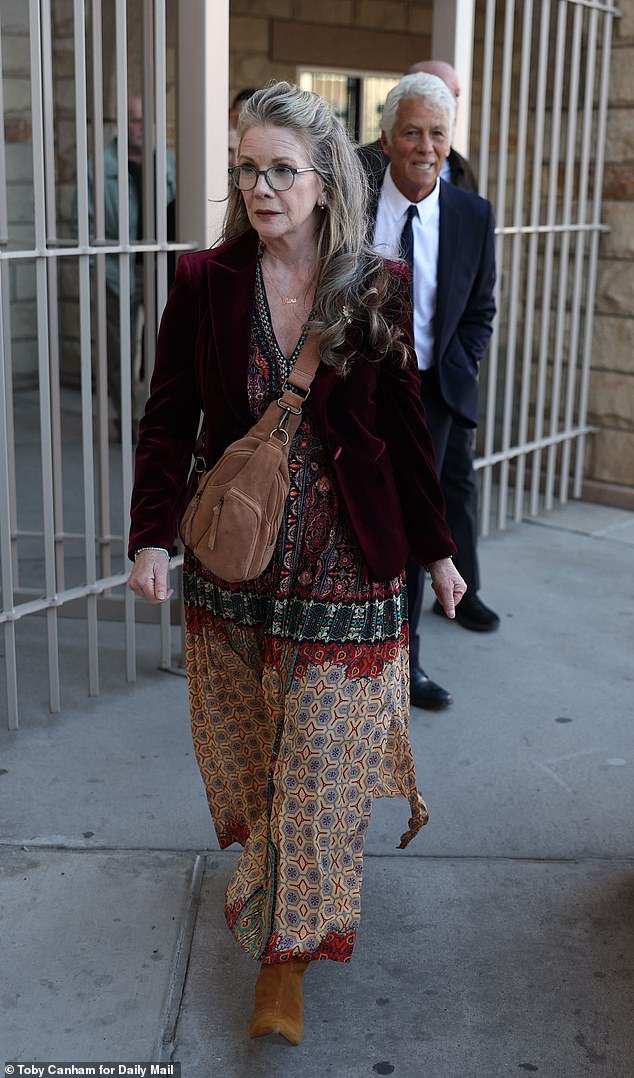 Stone-faced Melissa Gilbert was seen walking into her husband's pretrial hearing on Tuesday, arriving nearly an hour early before it was due to start