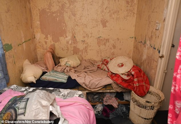 An image released by police of the victim's cluttered and undecorated bedroom