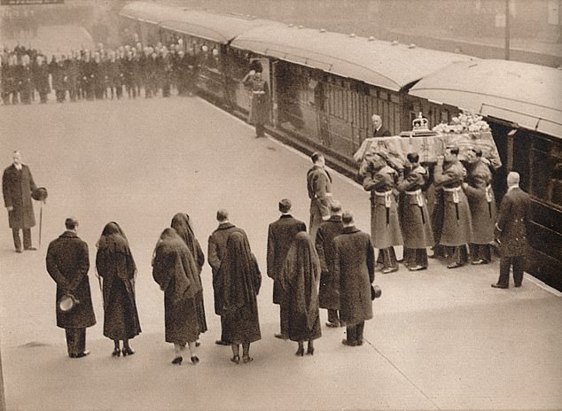 The coffin covered by the Royal Standard and surmounted with the Imperial Crown was watched by the royal mourners among whom Queen Mary is third from the left