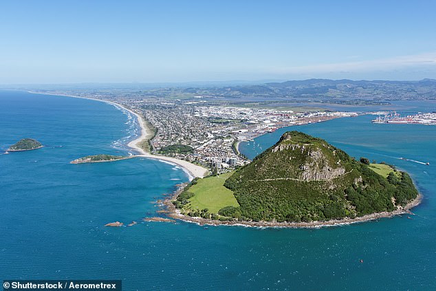 Mount Maunganui (pictured) on New Zealand's North Island is a popular holiday hotspot