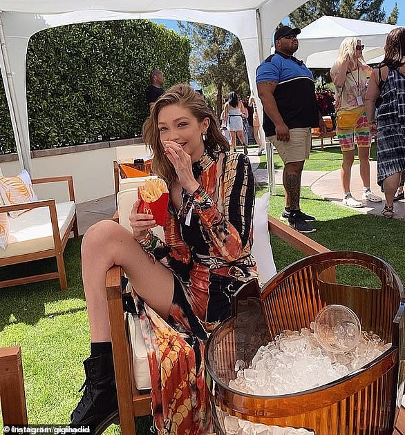 Show me the fries: Supermodel Gigi Hadid with a large McDonald's fries in a photo shared on her Instagram