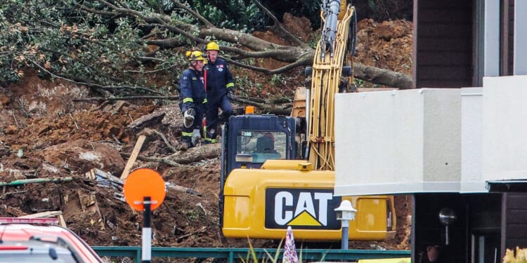 Desperate search for missing children after terrifying landslide rips through campsite burying tourists in New Zealand