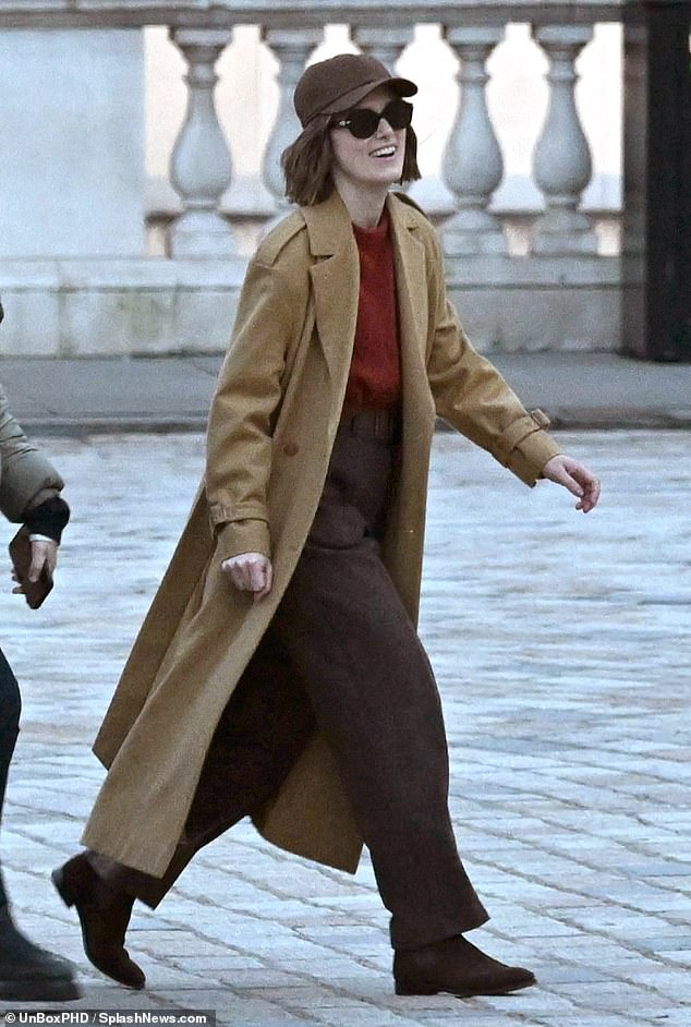 She was later seen smiling as the cameras stopped rolling in the series, in which she stars alongside Ben Whishaw