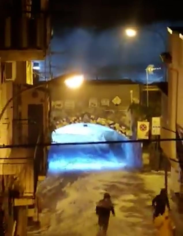 Footage shows massive waves striking Sicily on Tuesday night as the Mediterranean was battered by powerful Storm Harry