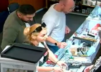 Moment Romanian gang member steals £6k diamond ring from under jeweller's nose